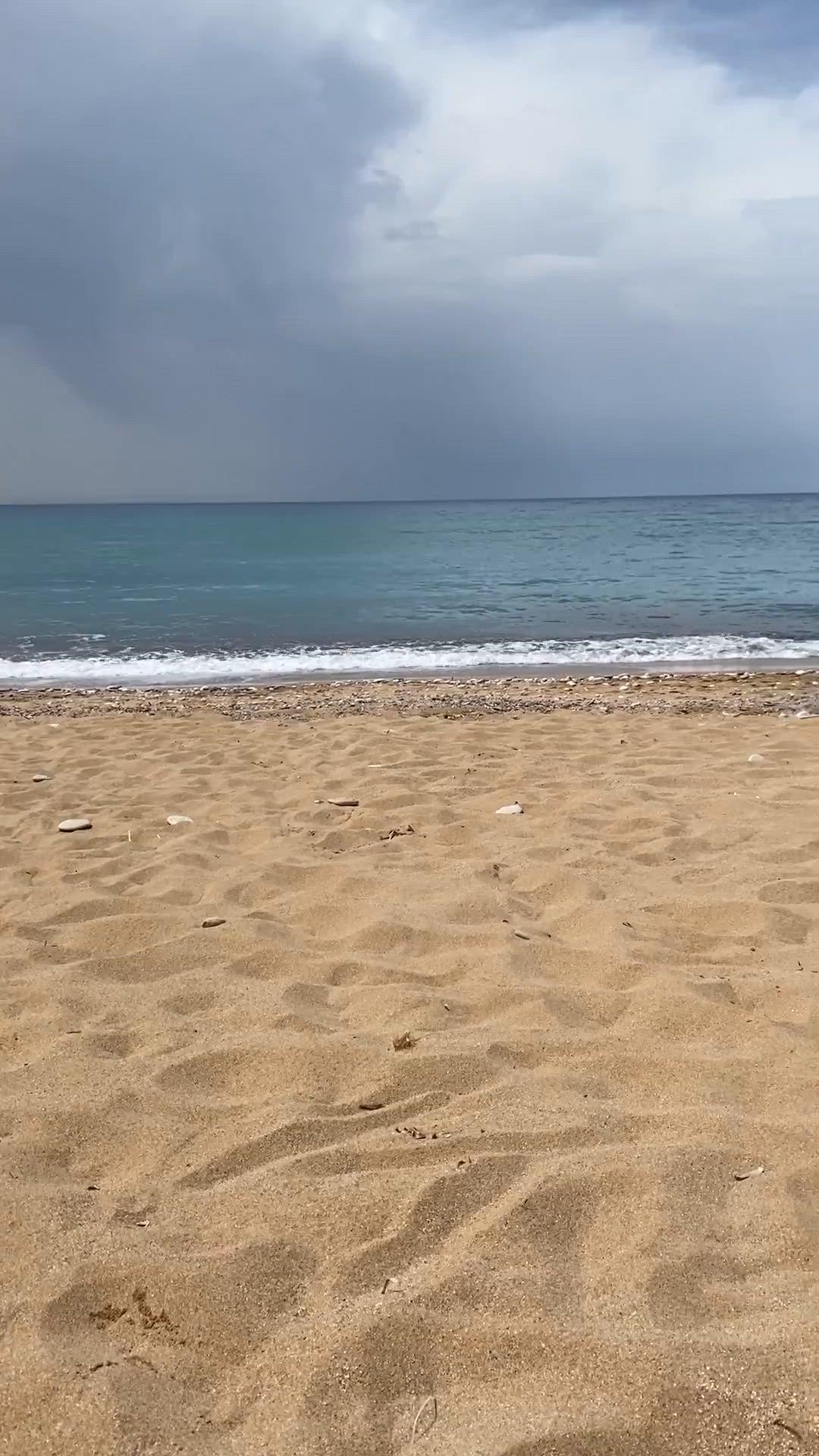Stripping down on the beach for all to see - free porn video