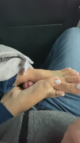 Sneaky footjob in the back of a packed van on our road trip! - free porn video