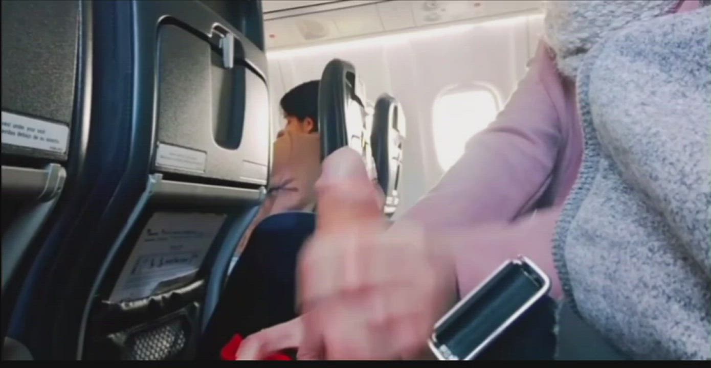 Giving handjob on a plane while people sitting next to me 😈 why not ;) - free porn video