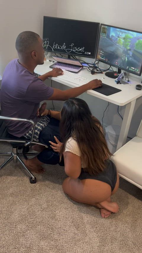 Stroking his big black cock while he plays his games - free porn video
