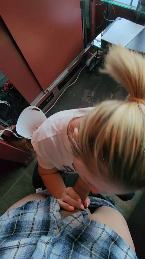 Sucking cock behind the counter at work - free porn video