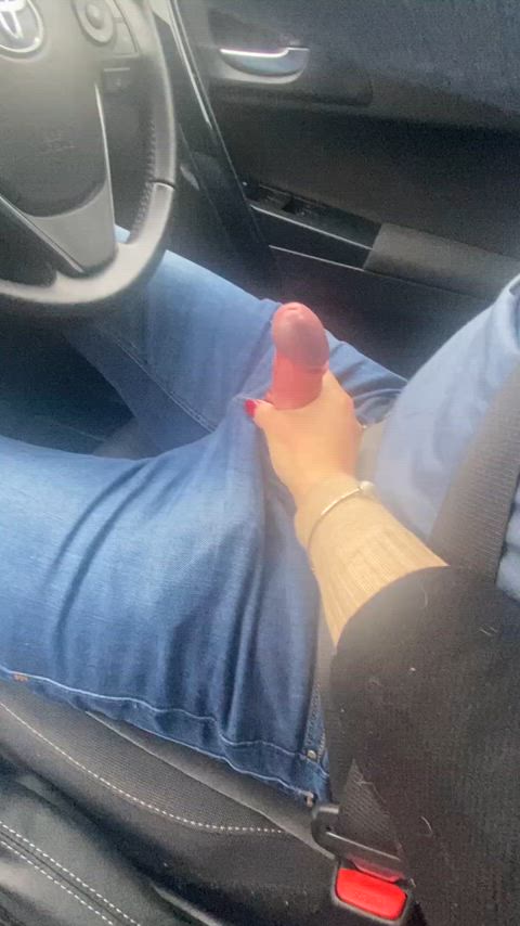 Stroking his cock in the car - free porn video