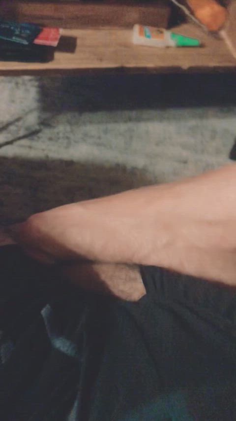 Pinning down his hung cock with her foot - free porn video
