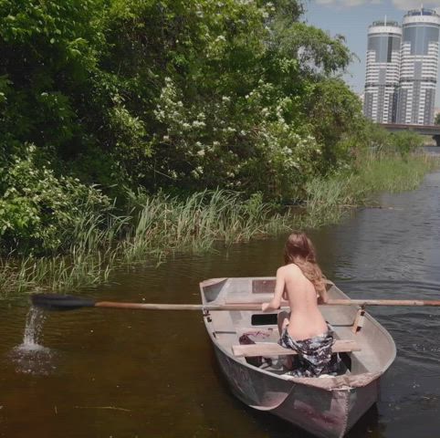 Mila Azul rows a boat in a public park [GIF] - free porn video