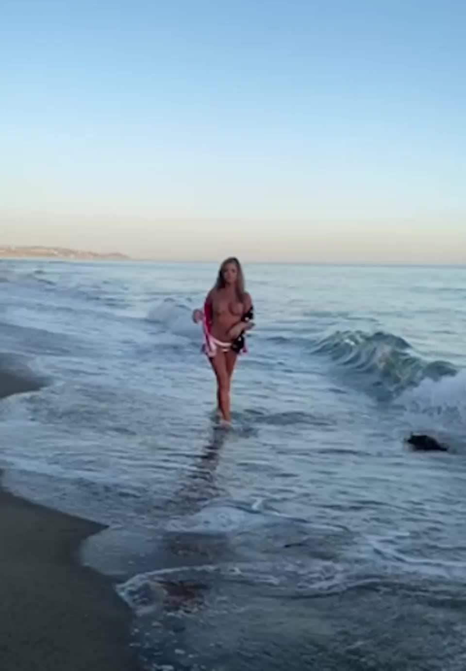 Denise Richards walking down a beach topless at 51 - free porn video