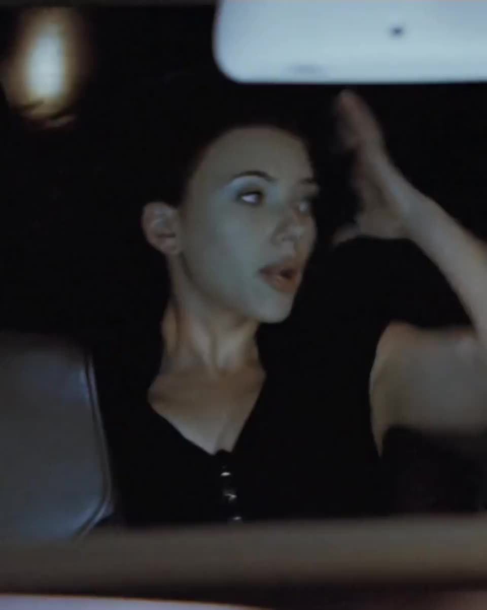 Scarlett Johansson stripping in the back of the car - free porn video