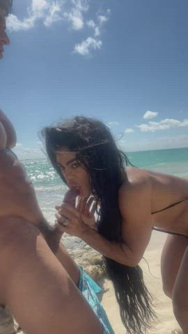 Liking the pre cum out on the beach - free porn video