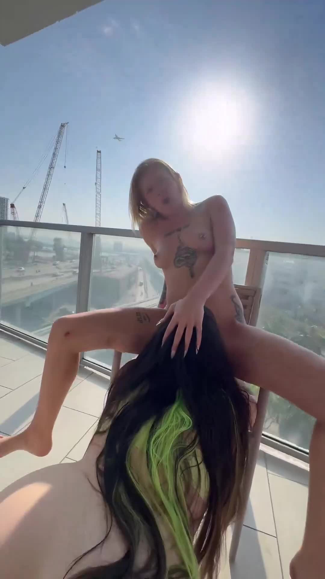 Fucking on the balcony so others can watch  - free porn video