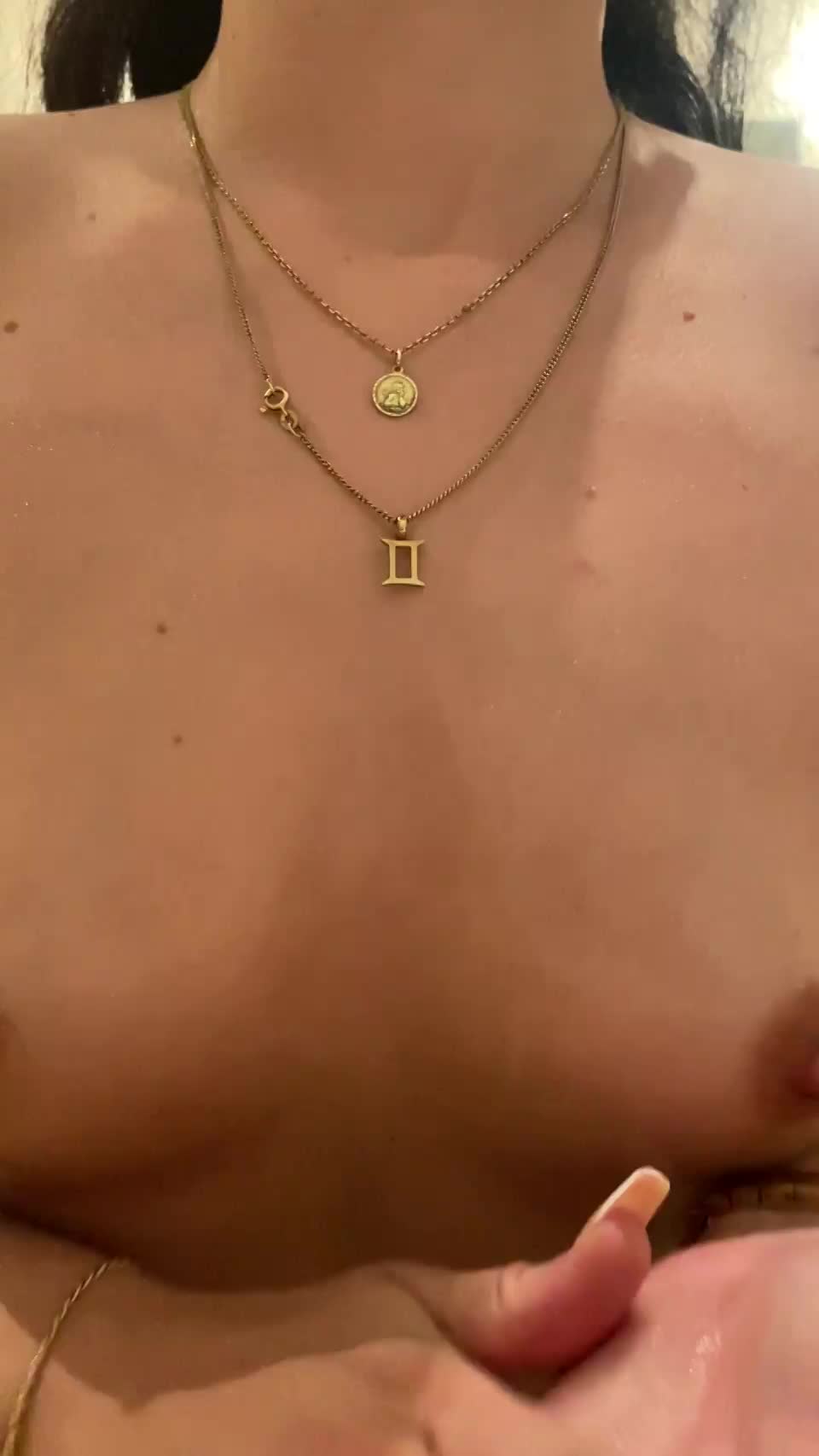 rubbing my tits with oil because it makes me horny - free porn video