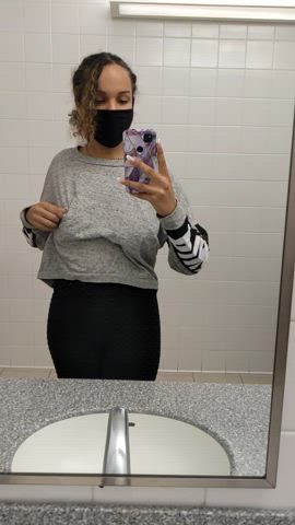 Showing off my teen DDs in the public restroom - free porn video