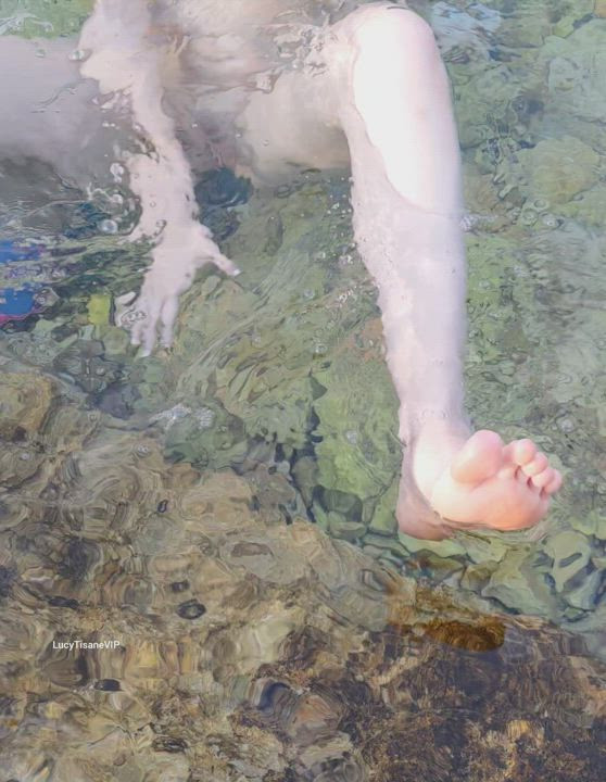 Some underwater fun on a public beach. - free porn video
