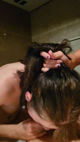 One girl helping another suck on a thick cock - free porn video