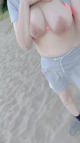 Here I am topless running in the sand at the beach - free porn video