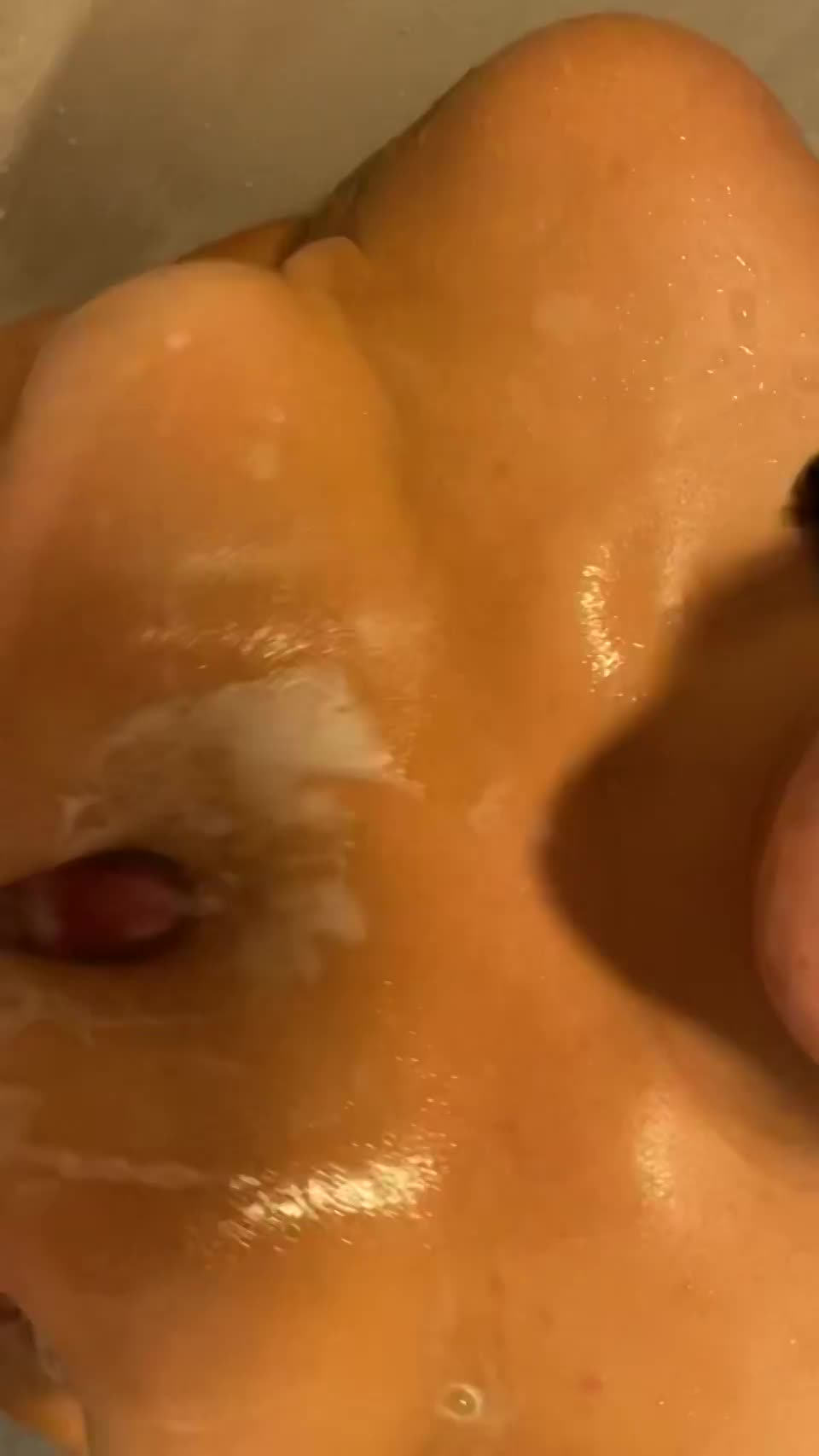 Milking him with my tits in the shower - free porn video