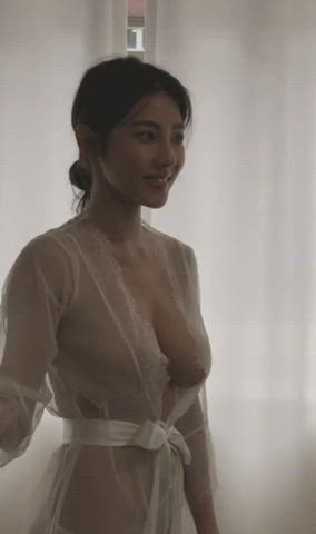 Who's this Asian beauty with big boobs ? - free porn video