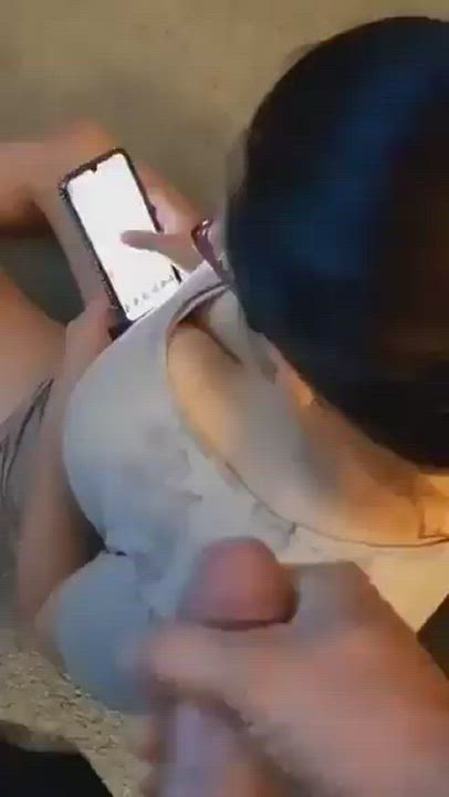 Too busy with her phone to care - free porn video