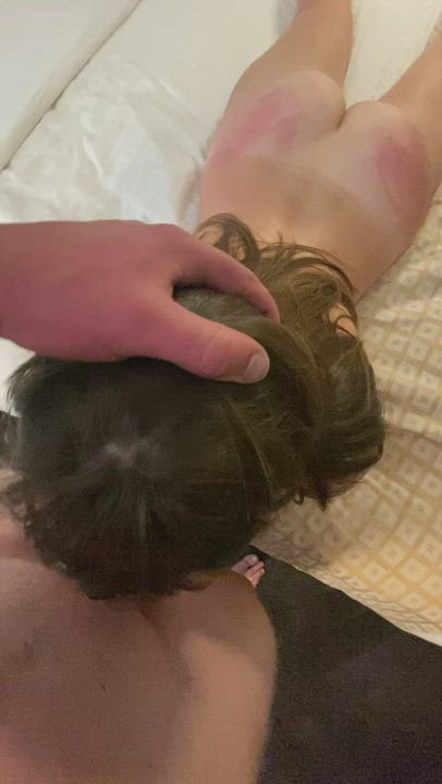 Adding another mark to her ass as she throats my cock while blindfolded - free porn video