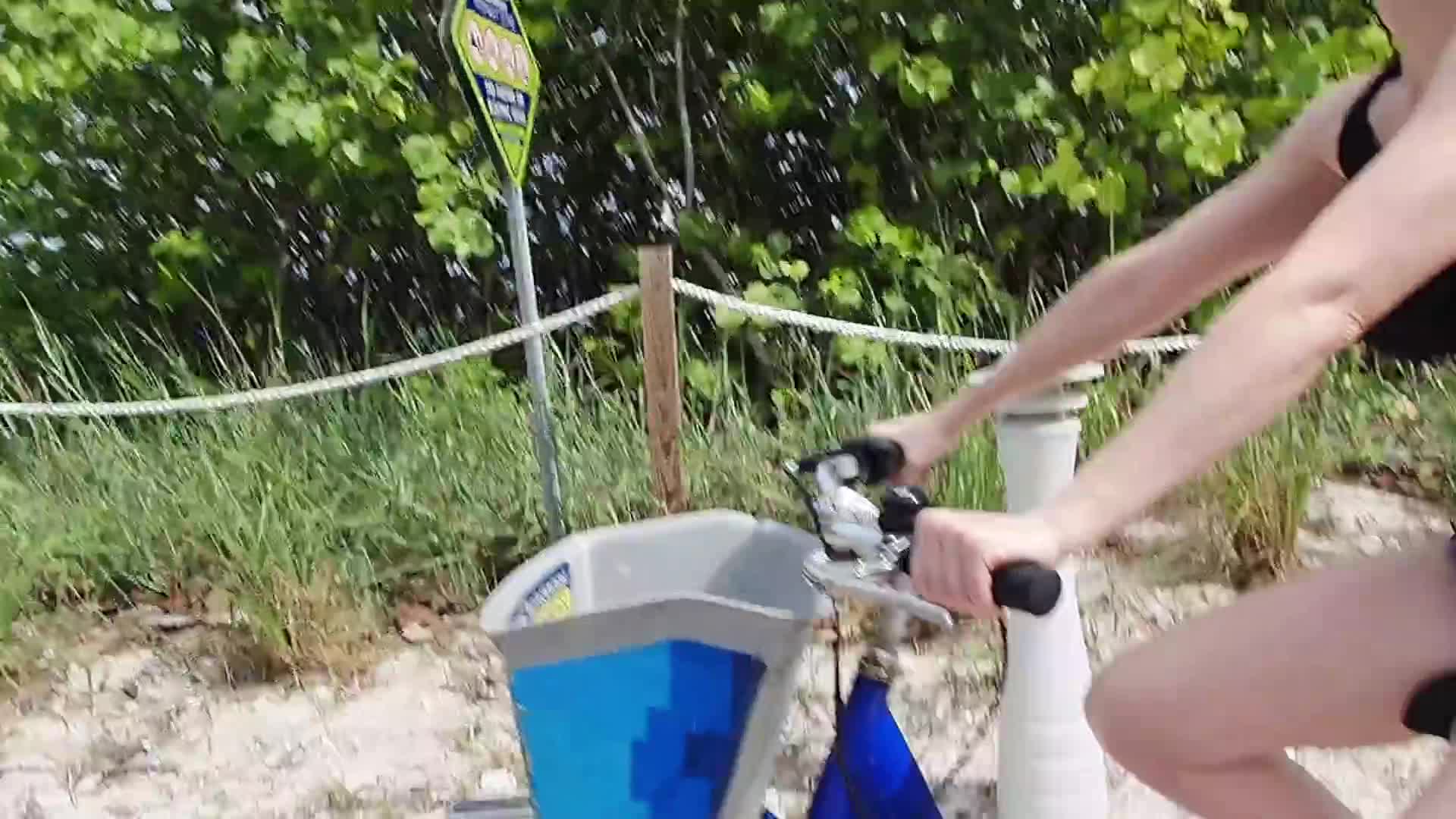 Flashing while riding a bike [GIF] - free porn video