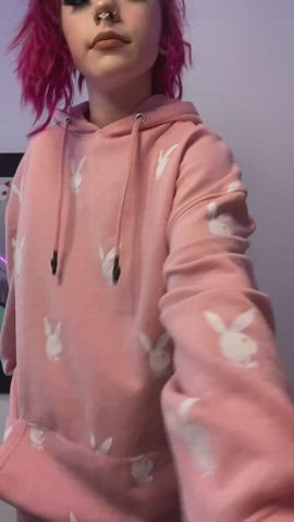 Pink haired playboy bunny strips off her big hoodie - free porn video