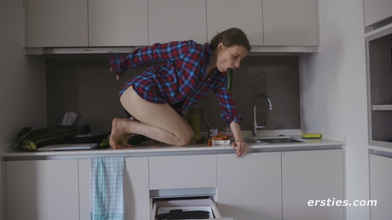 Fucking her own ass on her counter. - free porn video