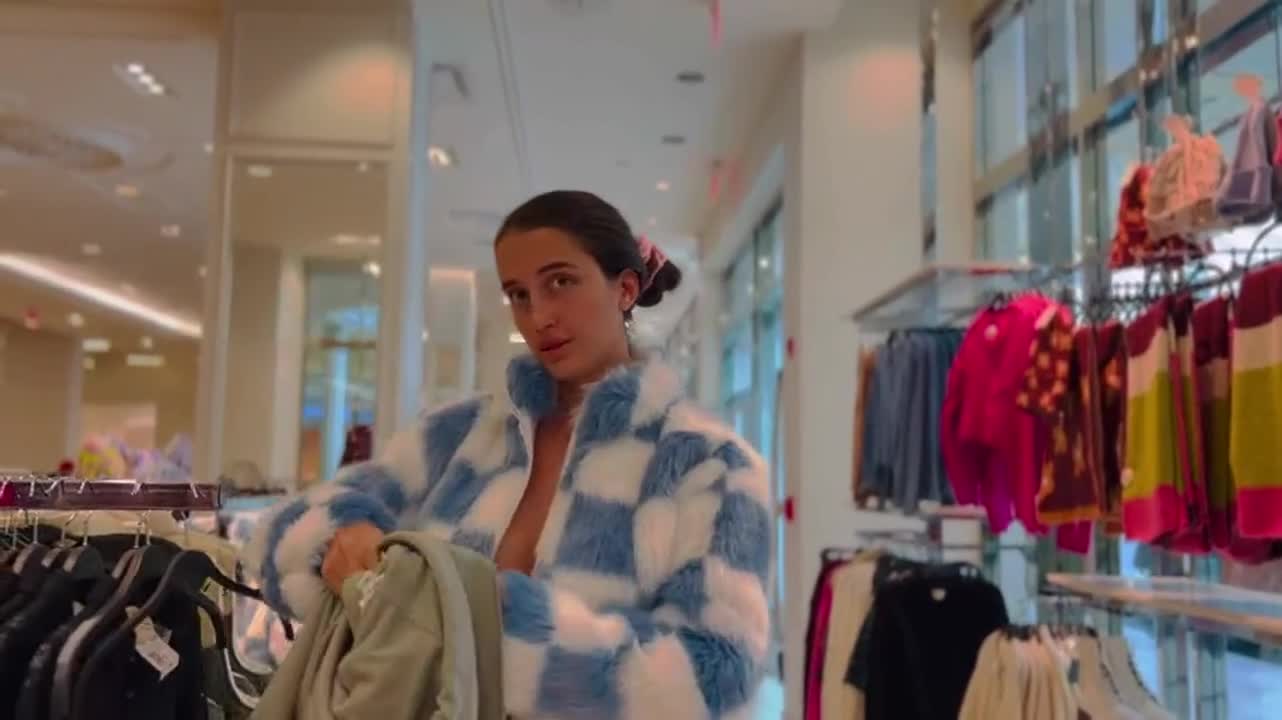 Without a bra in the store [gif] - free porn video