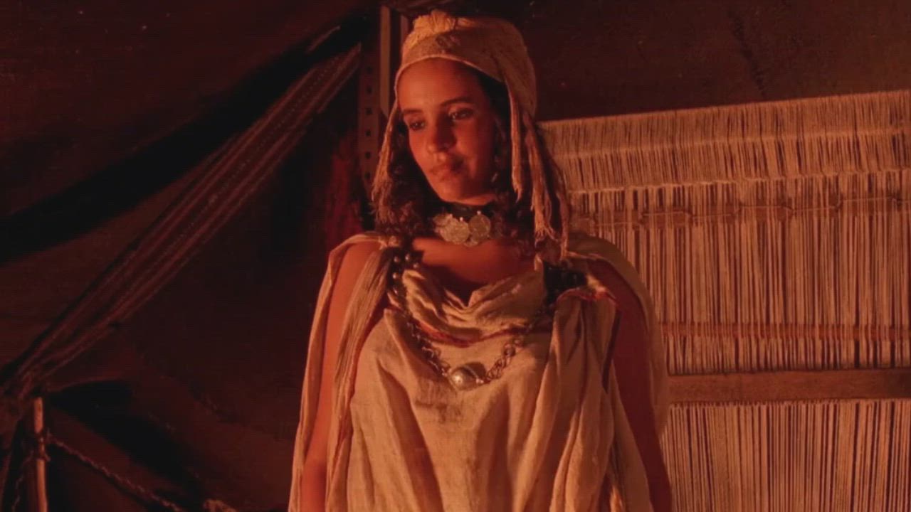 Amina Annabi in "The Sheltering Sky" (1990) - free porn video