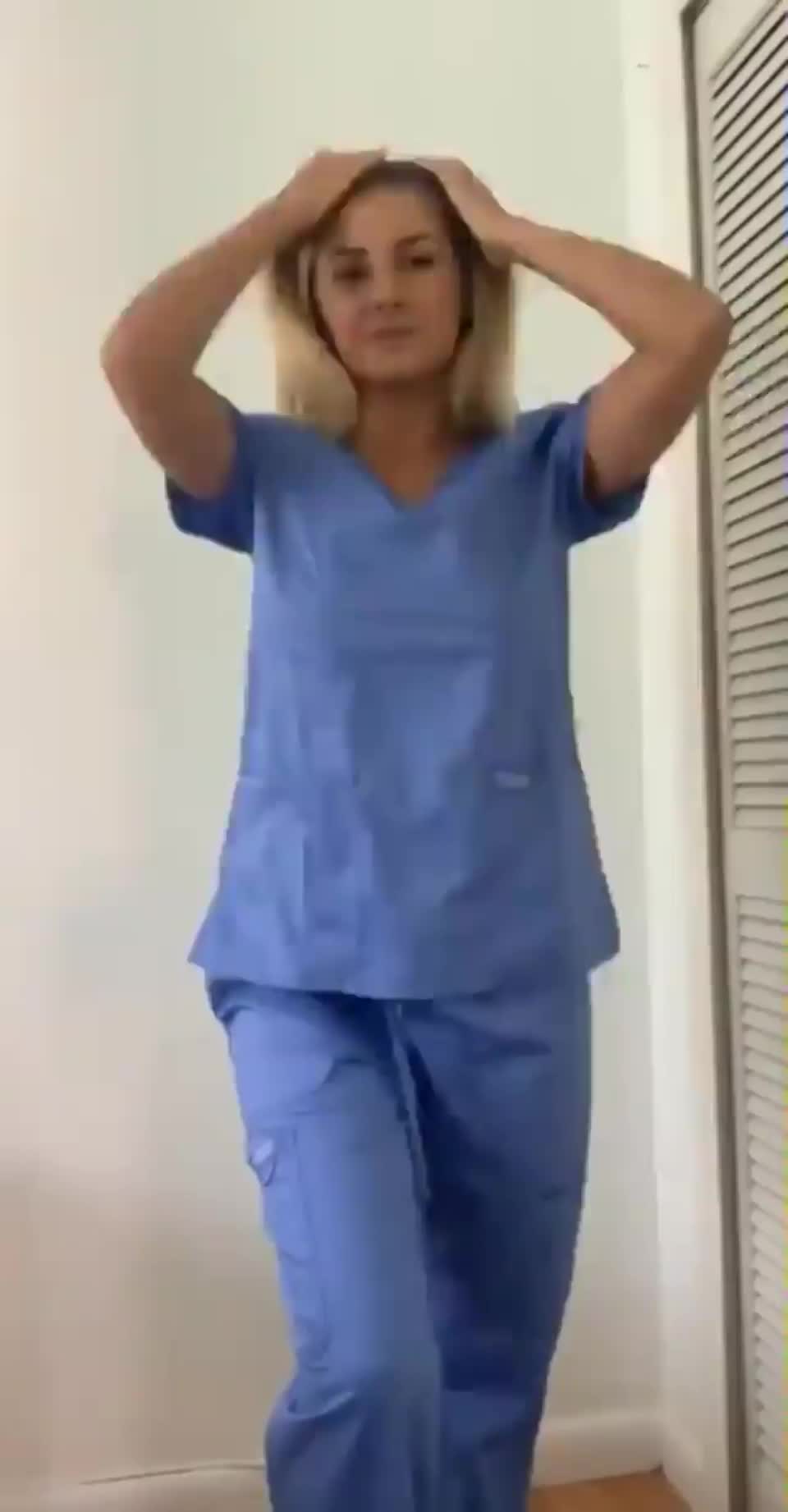 Beautiful blonde nurse strips off her clothes and bends over - free porn video