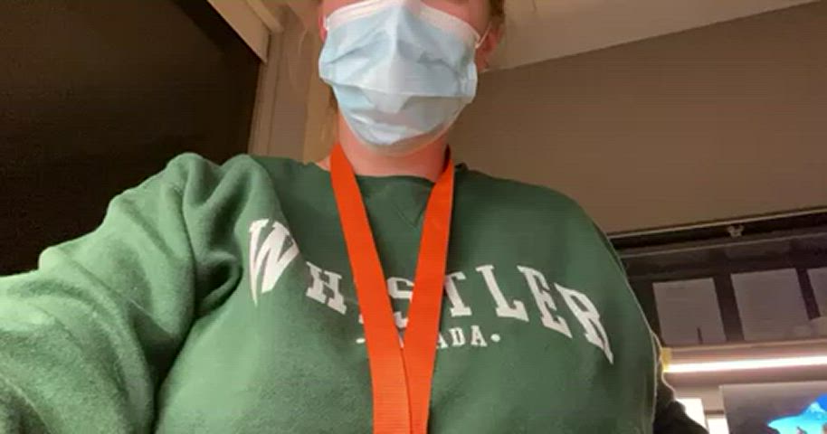 Naughty nurse playing with her tits with the office door open [GIF] - free porn video