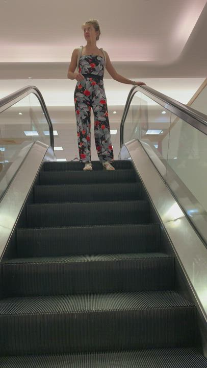 1st time flashing on the escalator [GIF] - free porn video