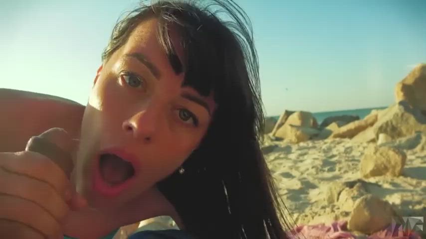 thick facial on a public beach - free porn video