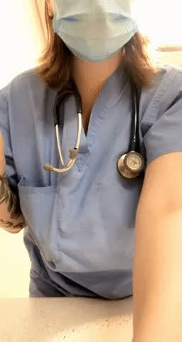 Nurse showing boobs at work - free porn video