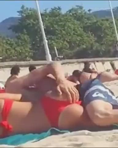 Sex on a public beach, in between people...is he in or not - free porn video